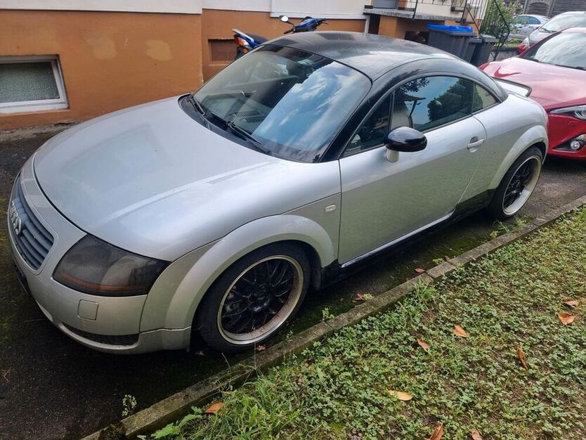 TT
