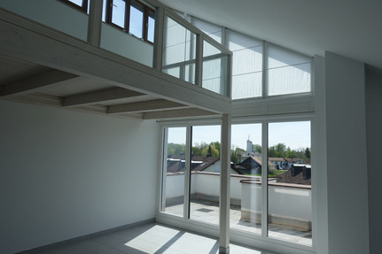 Helle Dachgeschoßwohnung mit Weitblick ins Grüne