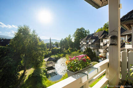 Helle Maisonettewohnung am Rössleberg mit TG-Stellplatz I Weitblick über Naturteich 3 zimmer